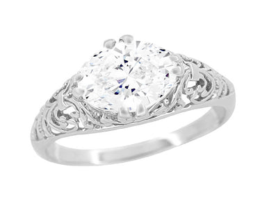 Platinum Edwardian Scroll Filigree East to West 1.10 Carat Oval Diamond Engagement Ring