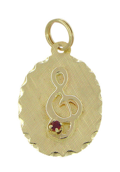 Treble Clef Charm in 14 Karat Gold