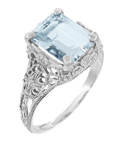 Oval Aquamarine Ring with Diamond Shoulders in 9ct Yellow Gold