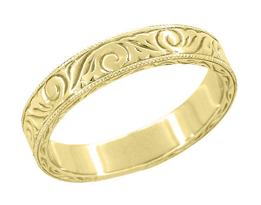 Women's rounded edge engraved wedding ring in yellow gold